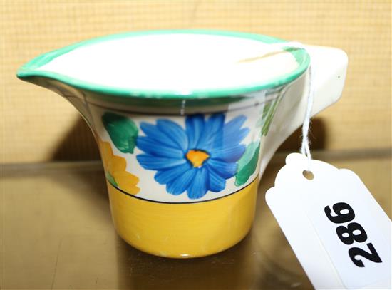 Claric Cliff Bizarre Sungay milk jug, banded in yellow and green with stylised flowers